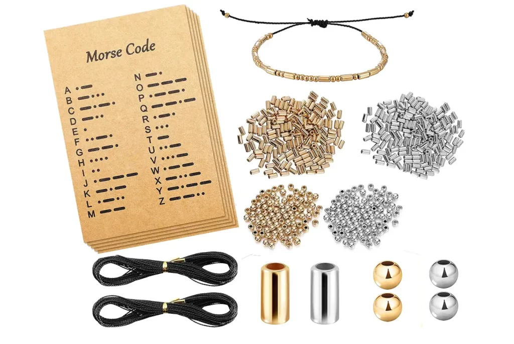 Cards with Morse code written on them and bread in silver and gold.