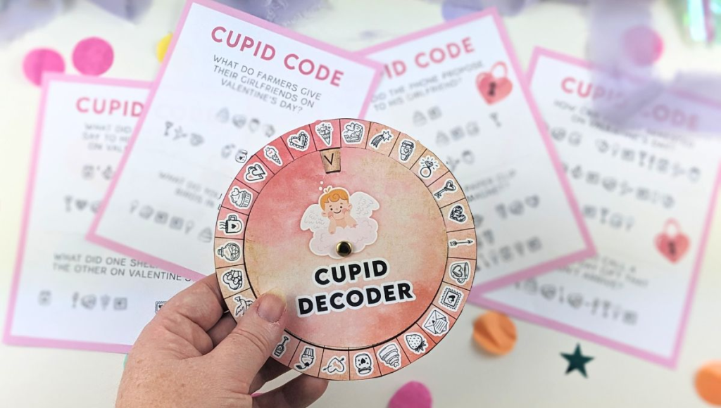 Cupid Decoder wheel from a Valentine’s Day printable puzzle game, surrounded by fun Cupid Code cards.