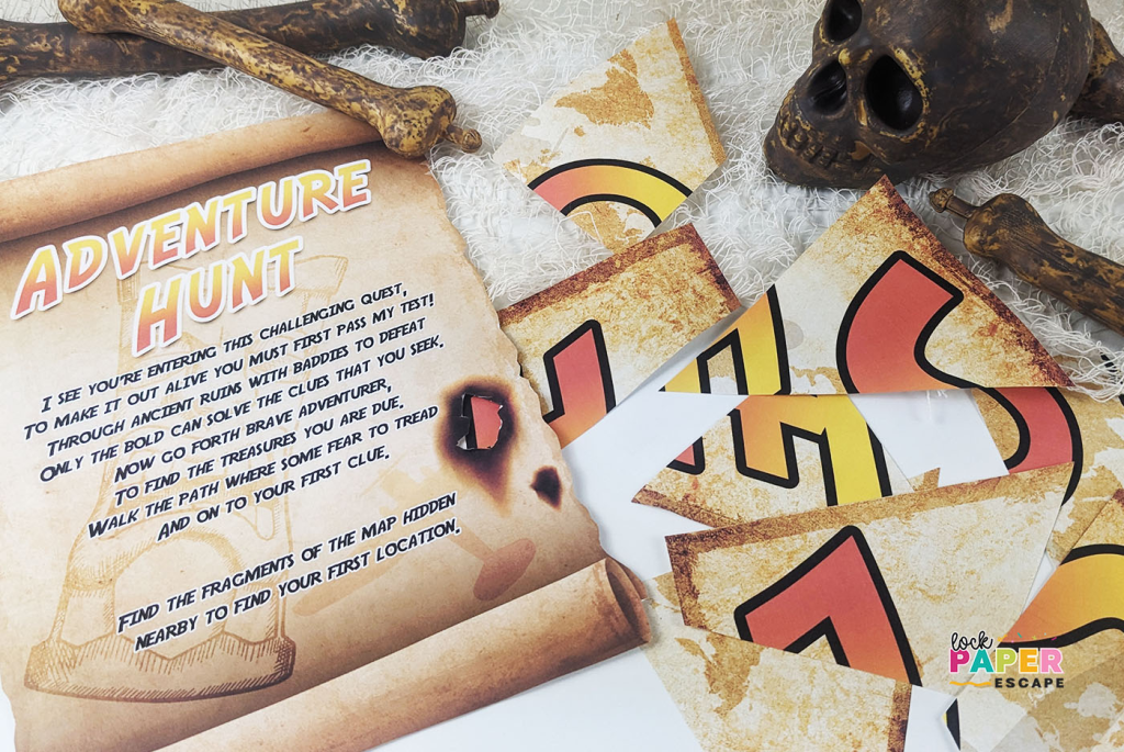 A vintage-looking scroll with adventure hunt, written on it, and a jigsaw puzzle waiting to be solved. 