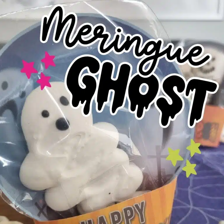 A photograph of a meringue ghost, with a bold title and colourful stars.