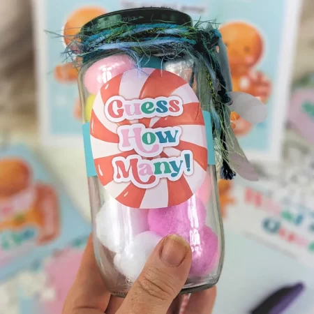 A jar decorated with a label that says guess how many.