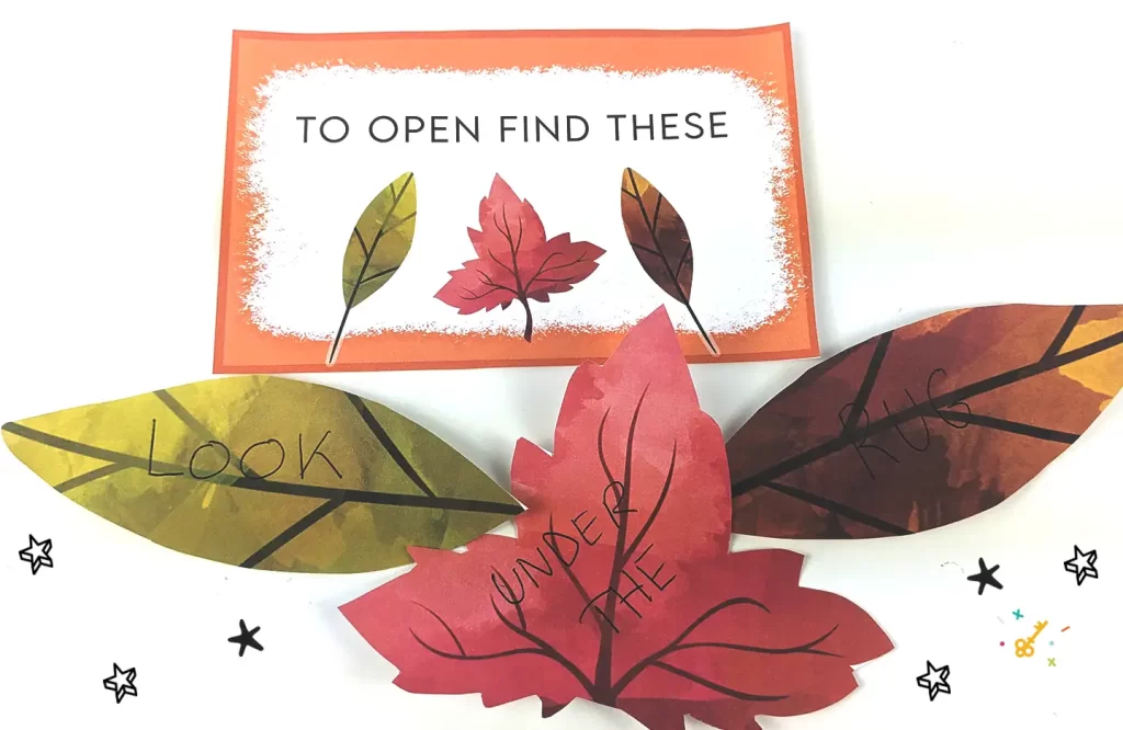 A clue thanksgiving card and set of leaves with the words "look under the rug" written on them.